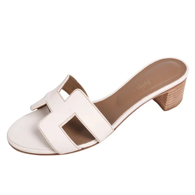 Hermès Sandals Oasis Logo Leather in Leather from The Reluxe, photo 1 of 1