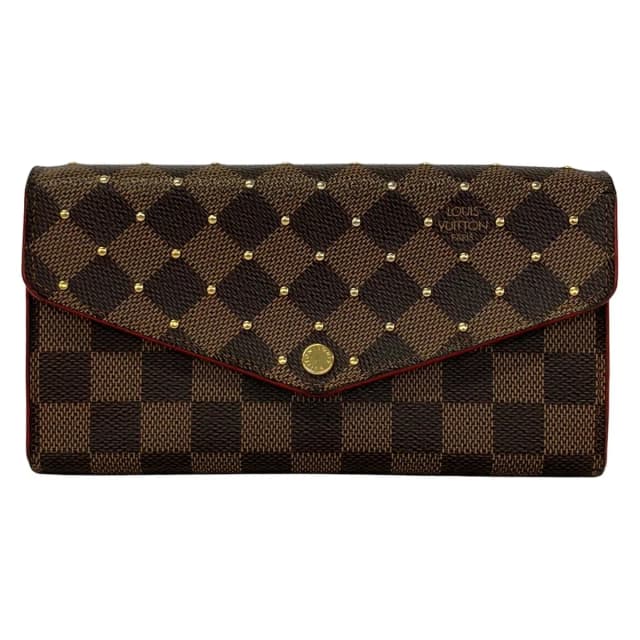 Louis Vuitton Wallet Damier Studs Portefeuille Sarah Ebene Rouge Leather in Brown Leather from The Reluxe, photo 1 of 1