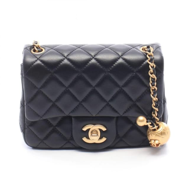Chanel Shoulder Bag Mini Quilted Black Lambskin Chain in Black Lambskin from The Reluxe, photo 1 of 1