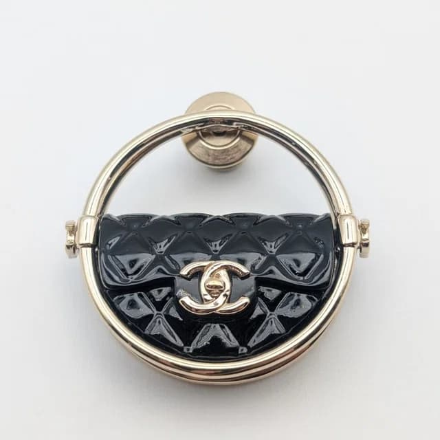 Chanel Brooch CC Logo Turnlock Quilted Bag Motif Gold Black Pin Badge 23c in Black from The Reluxe, photo 1 of 1