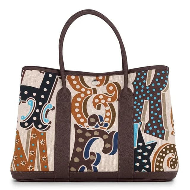 Hermès Tote Bag Garden Party PM Electric Ebene Silver Toile H Negonda in Brown from The Reluxe, photo 1 of 1