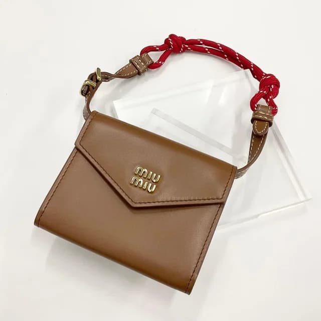 Miu Miu Logo Compact Wallet Shoulder Card Case in Leather from The Reluxe, photo 1 of 1