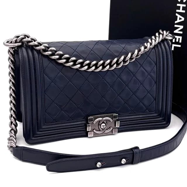 Chanel Boy Quilted Chain Shoulder Bag Navy Lambskin in Navy Lambskin from The Reluxe, photo 1 of 1