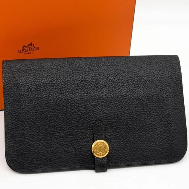 Hermès Dogon GM Duo Taurillon Clemence Gold Togo Wallet in Gold Togo leather from The Reluxe, photo 1 of 1
