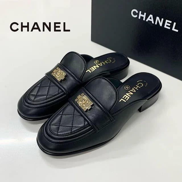 Chanel CC Logo Lambskin Quilted Boy Mules in Lambskin from The Reluxe, photo 1 of 1