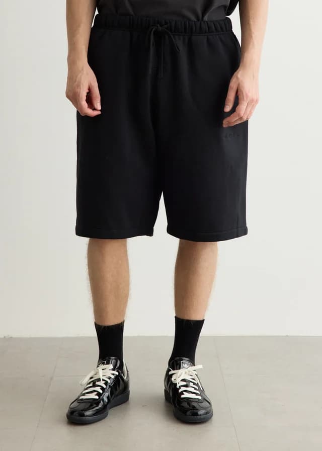 Fear of God Essentials Active Trace Relaxed Shorts in VINTAGE BLACK, image 1 of 1 from Incu
