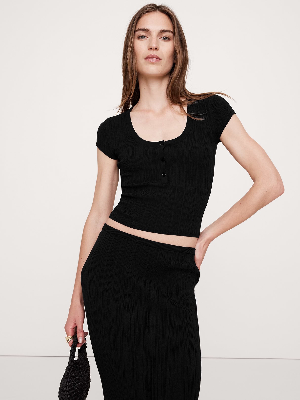 Crinkle Knit Cap-Sleeve Henley in Black, image 1 of 1 from Banana Republic (US)