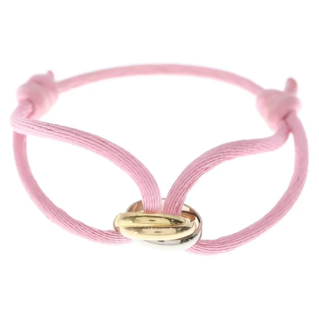 Cartier Baby Trinity Code Bracelet Pink Yellow Gold in Pink from The Reluxe, photo 1 of 1