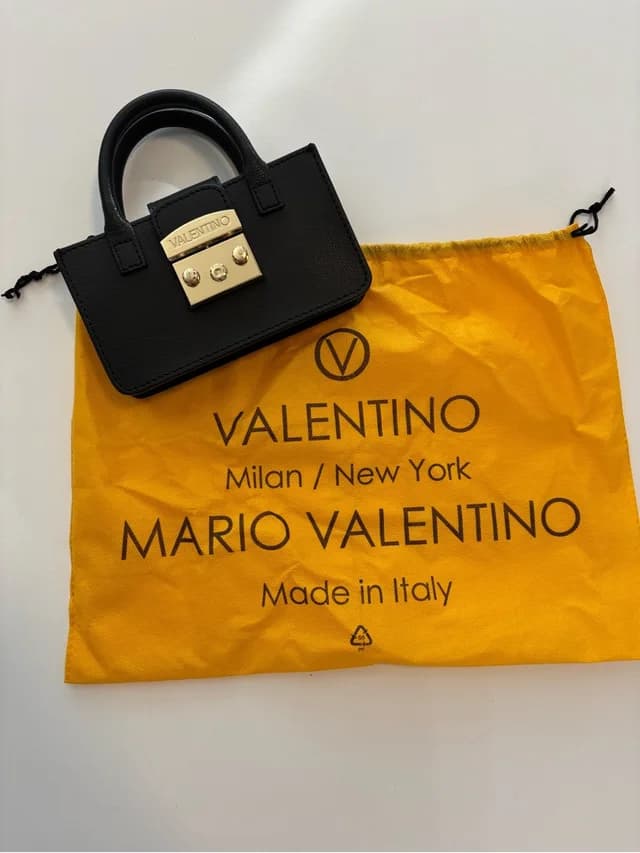 By Mario Valentino Poppy Bonbonniere Cross Body in black Leather from Poshmark, photo 1 of 1