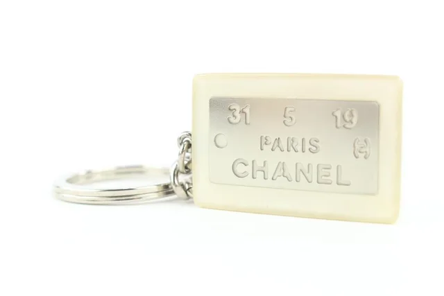 Chanel Rare White x Silver 99a CC Logo Address Plate Keychain Bag Charm in White Canvas from Bagriculture, photo 1 of 1