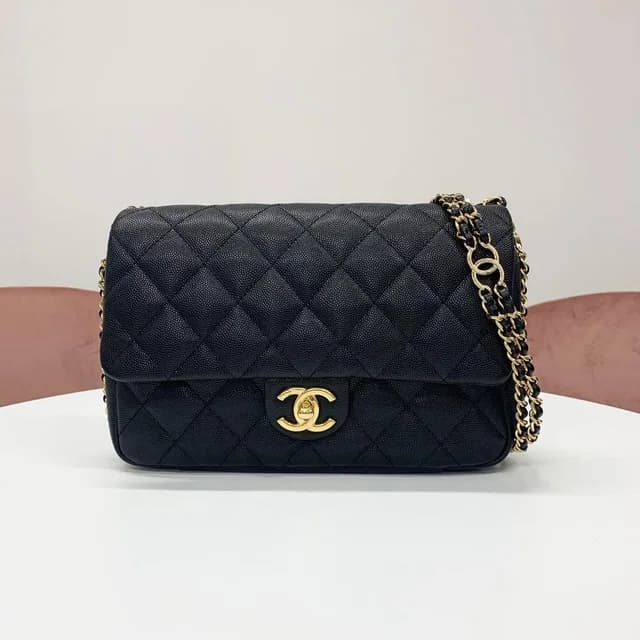 Chanel Quilted Turnlock CC Logo Double Chain Shoulder Bag in Caviar leather from The Reluxe, photo 1 of 1
