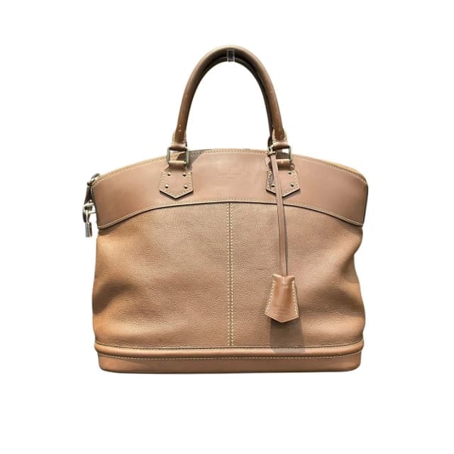 Louis Vuitton Rock It MM Suhali Handbag Goatskin in Goatskin from The Reluxe, photo 1 of 1