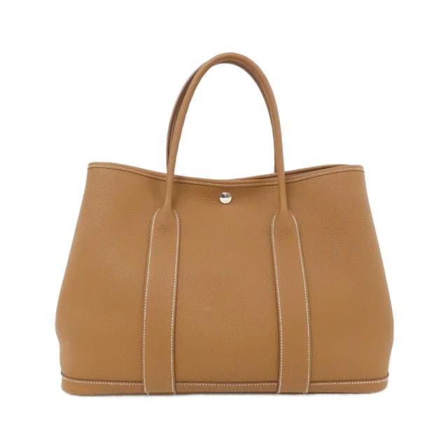 Hermès Garden Party 36 Tote Bag Gold Silver in Gold from The Reluxe, photo 1 of 1