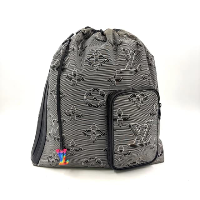 Louis Vuitton Drawstring Leather Nylon Black White Backpack in Black Nylon from The Reluxe, photo 1 of 1