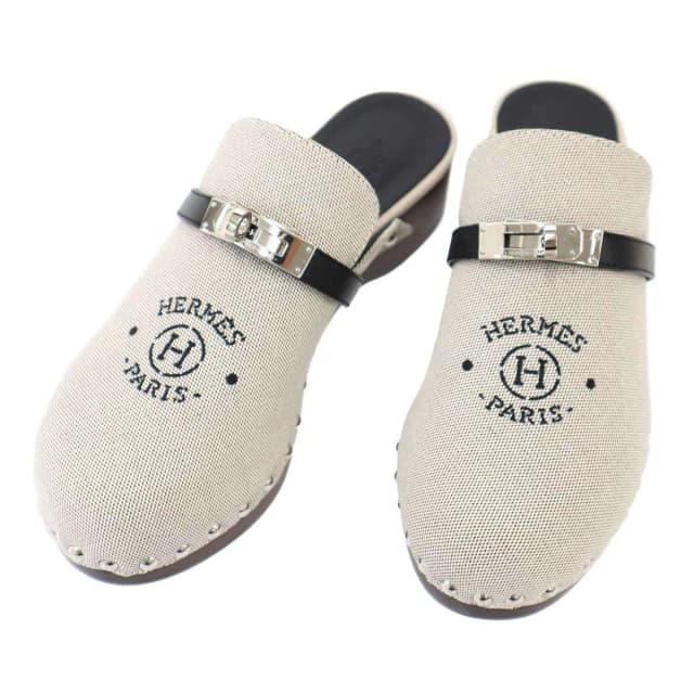 Hermès Carlotta Mules Clogs Logo Kelly Sandals Gray Black in Black from The Reluxe, photo 1 of 1