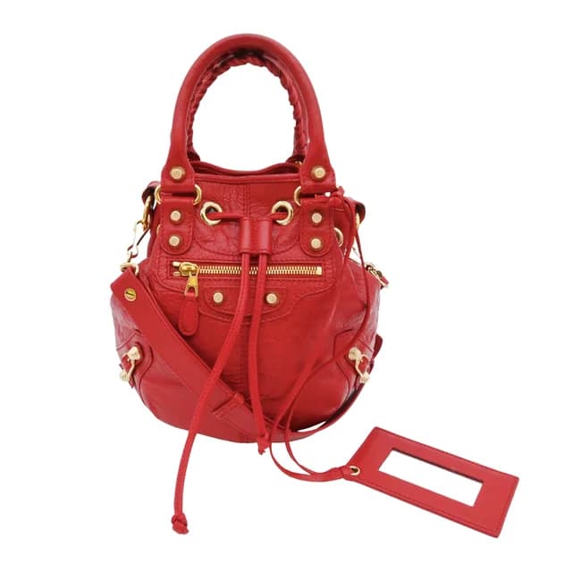 Balenciaga Giant 12 Mini Pompon Red Leather Bucket Crossbody Bag in Red Leather from Clotheshorse Anonymous, photo 1 of 1