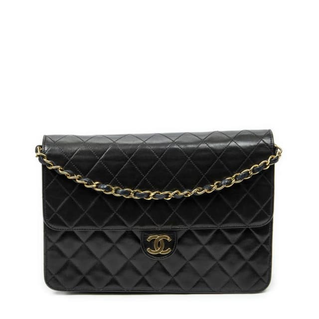 Chanel Vintage Pushlock Straight Flap Bag Black Quilted Lambskin Leather in Black Lambskin from The Reluxe, photo 1 of 1