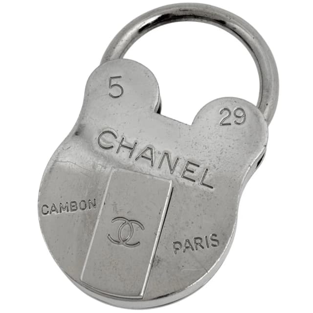 Chanel Charm CC Logo Padlock Metal Silver Keychain in Silver from The Reluxe, photo 1 of 1