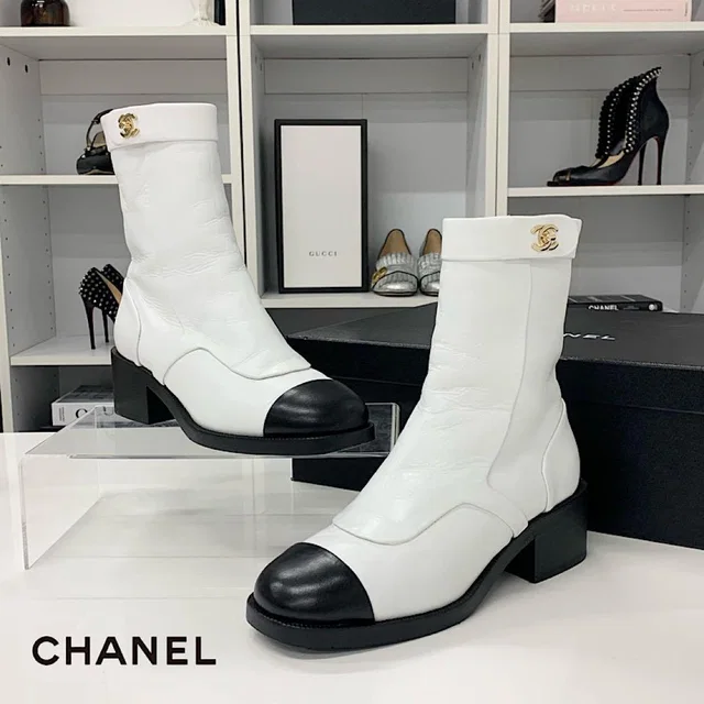 Chanel CC Logo Turnlock Leather Short Boots White Black in Black Leather from The Reluxe, photo 1 of 1