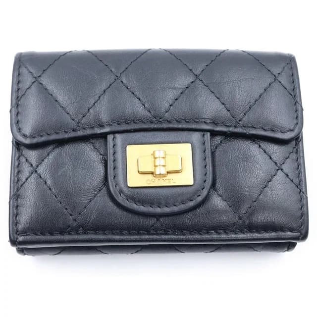 Chanel Quilted Compact Wallet Trifold Coin Purse Black Lambskin Gold in Black Lambskin from The Reluxe, photo 1 of 1