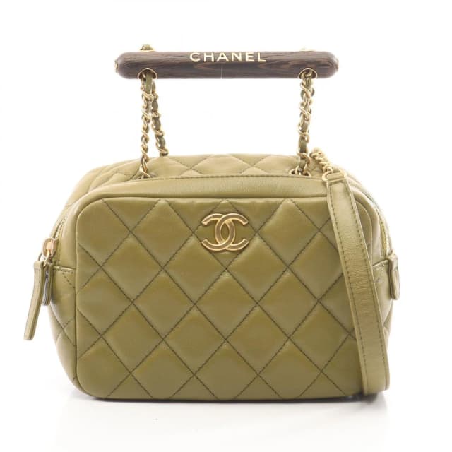 Chanel Shoulder Bag Quilted Mini Bow 2-Way Khaki Lambskin Wood Handle in Green Lambskin from The Reluxe, photo 1 of 1