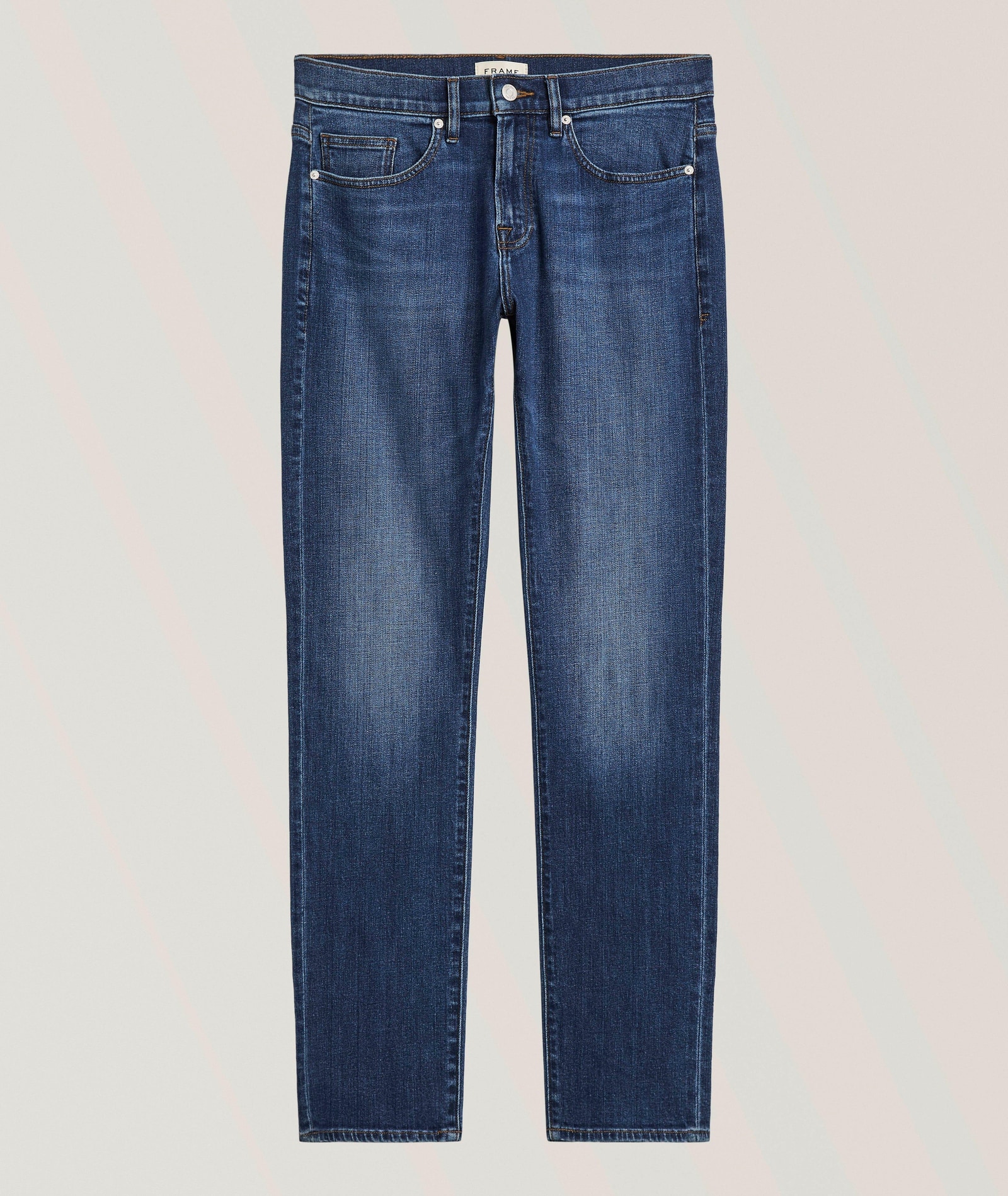 Frame L'Homme Slim Stretch-Cotton Jeans in Blue 96% cotton, 3% elasterell, 1% elastane, image 1 of 1 from Harry Rosen