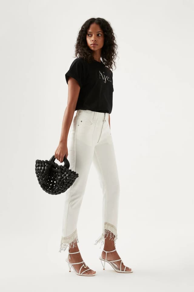 AJE Sheen Fringe Denim Jeans in WHITE, image 1 of 1 from Aje