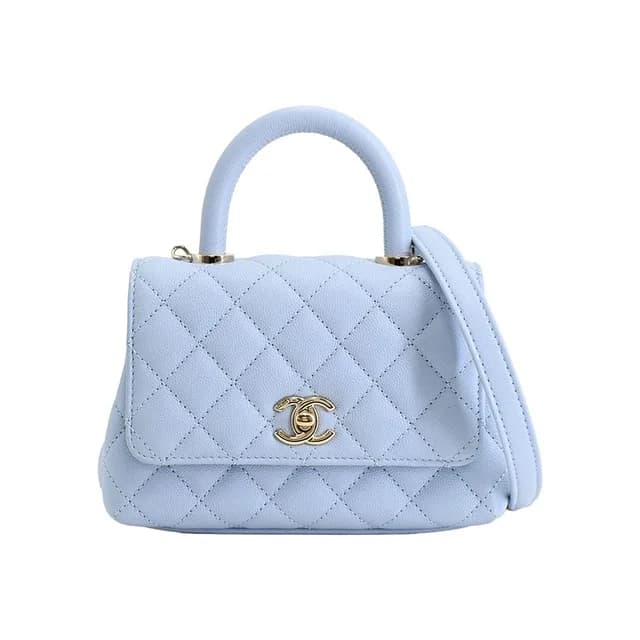 Chanel Handbag Top Handle Mini Flap Bag in Caviar leather from The Reluxe, photo 1 of 1