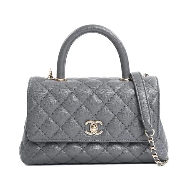 Chanel Handbag Top Handle Flap in Caviar leather from The Reluxe, photo 1 of 1