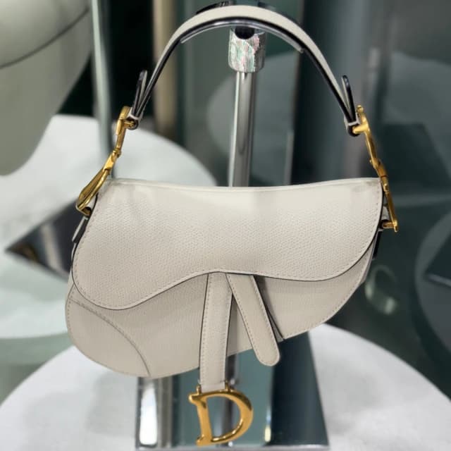 Dior Mini Saddle Bag White Grained Calfskin in White Caviar leather from Revivre Luxury Consignment, photo 1 of 1