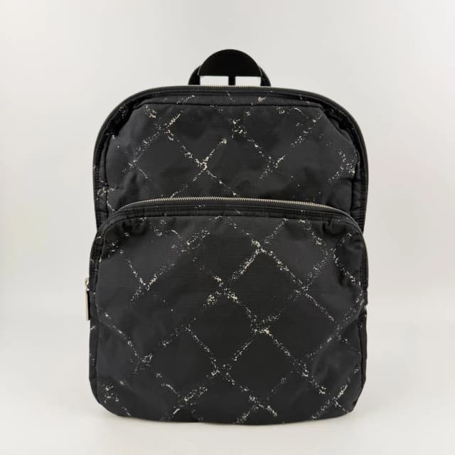 Chanel New Travel Line Backpack Nylon Black Vintage in Black Nylon from The Reluxe, photo 1 of 1