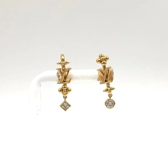 LV in the Sky Gold Plated Earrings in Gold from The Reluxe, photo 1 of 1