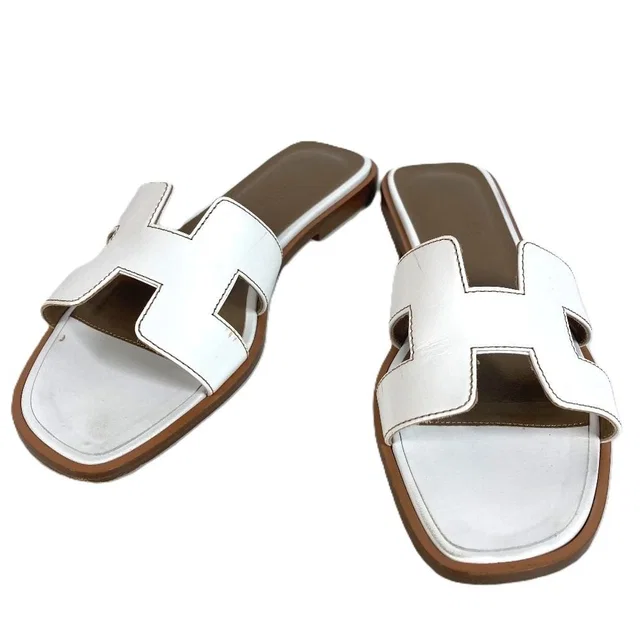 Hermès Sandals Oran Logo Leather White in White Leather from The Reluxe, photo 1 of 1