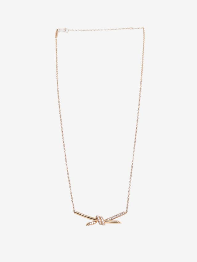Tiffany & Co. 18k Rose gold knot pendant in Pink from Sign of the Times, photo 1 of 1