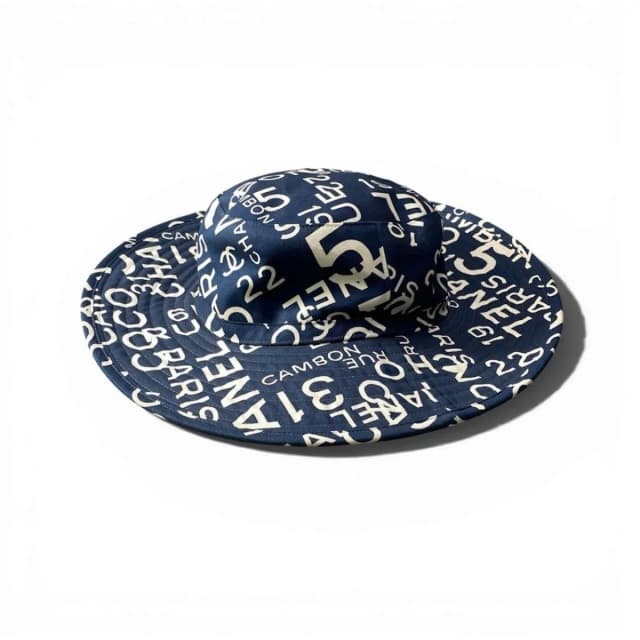 Chanel By Sea Logo CC Bucket Hat Navy Cotton in Navy from The Reluxe, photo 1 of 1
