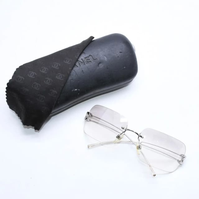 Chanel Rimless Sunglasses Side CC Logo Clear Silver Frame Metal 16 Eyewear in Silver from The Reluxe, photo 1 of 1