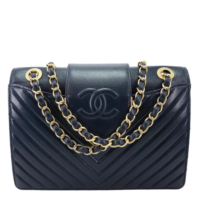 Chanel Collar and Tie Flap Mini Chevron Sheepskin Leather Crossbody Bag Navy Blue in Navy Leather from Dallas Designer Handbags, photo 1 of 1