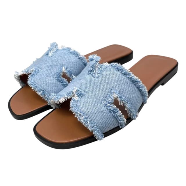 Hermès Sandals Oran 36.5 Denim Fringe Maxi Leather Blue Cler in Blue Denim from The Reluxe, photo 1 of 1