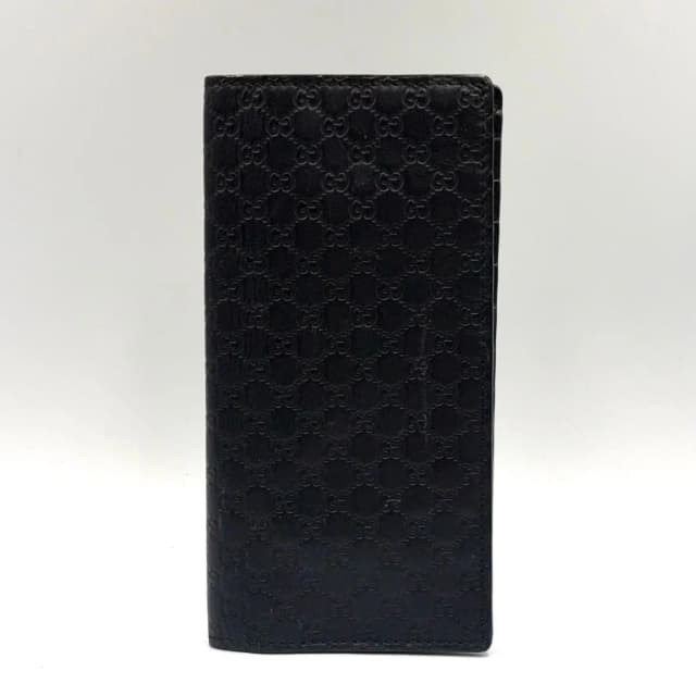 Gucci Micro Guccissima Leather Black Bifold Wallet in Black Leather from The Reluxe, photo 1 of 1